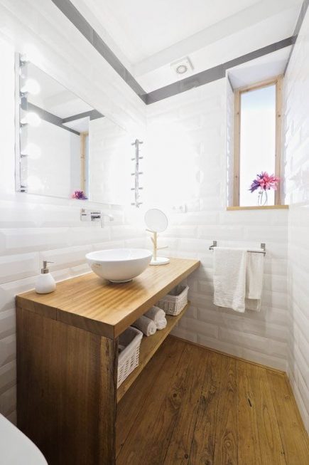 Foto de la instalación de un parquet hecha en un piso por Comparquets con colaboración con Woodmasters